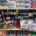 plaster and grout products on display at hardware store
