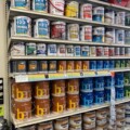 paint can brands on display at hardware store